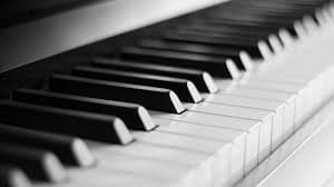 Piano keys and a keyboard instrument.